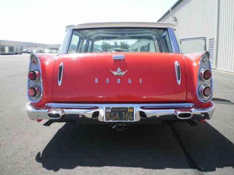 1991 Ford LTD Crown Victoria - Rear view of a red 1959 Dodge station wagon, a chrome bumper, dual exhaust, and distinctive taillights.