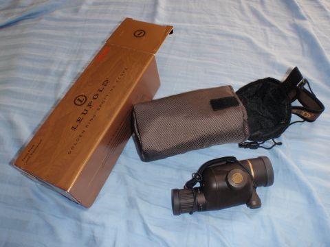 1991 Ford Bronco - Leupold Golden Ring spotting scope and its accessories are laid out on a blue cloth surface.