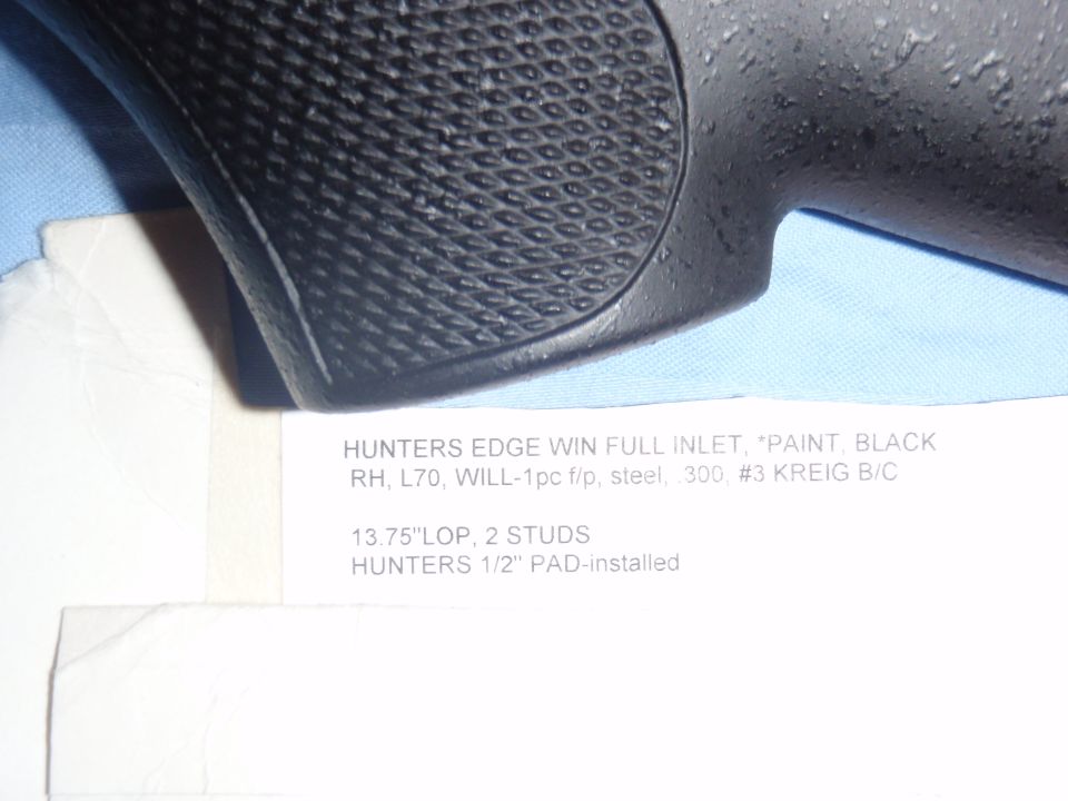 Close-up of black textured grip with text overlay
