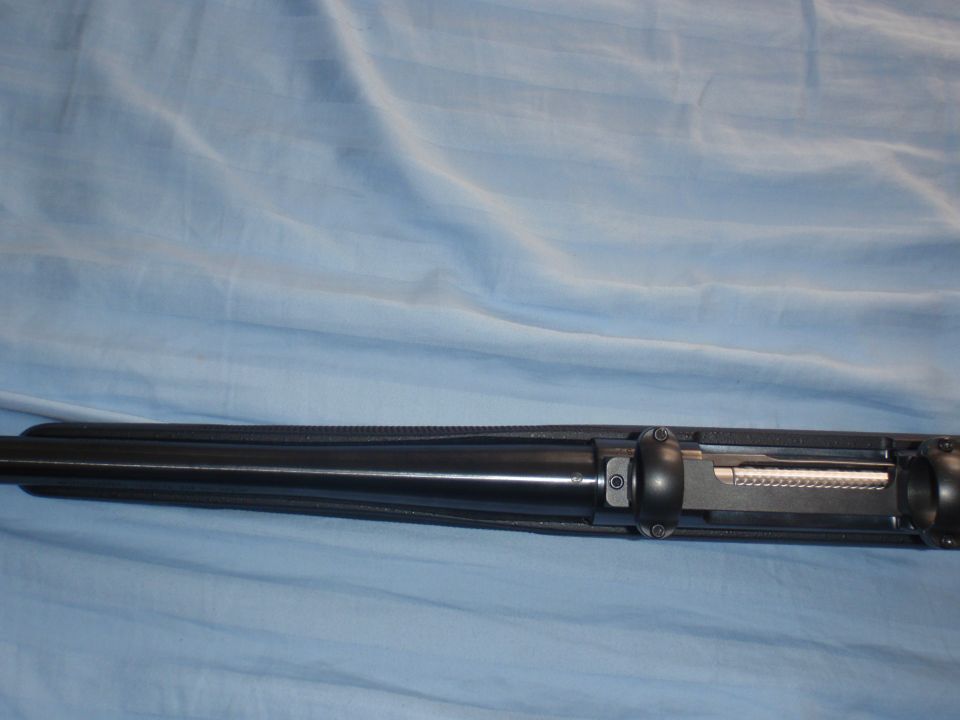 Close-up of a rifle's bolt and receiver mechanism