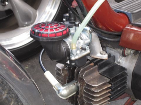 1981 Garelli Rally Sport - Close-up view of a moped's engine components, including the carburetor and air filter.