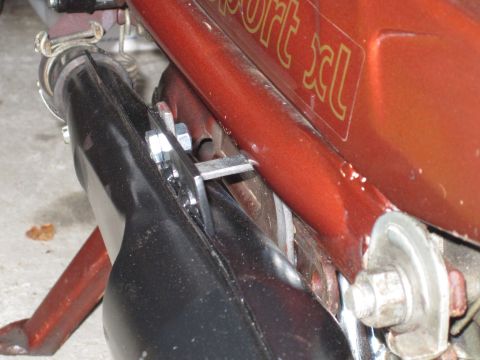 1981 Garelli Rally Sport - Close-up view of a motorcycle's frame and exhaust system, with partial model designation visible.