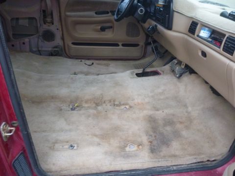 1997 Dodge 2500 - Interior view of a 1997 Dodge 2500 showing the floor pan after carpet removal.