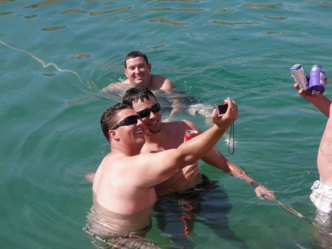 1982 Ford Bronco - Friends enjoying a day in the water, capturing memories with a selfie.