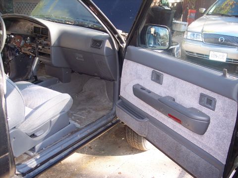 2006 Chevrolet Corvette - Interior view of a pickup truck, with another vehicle parked nearby.