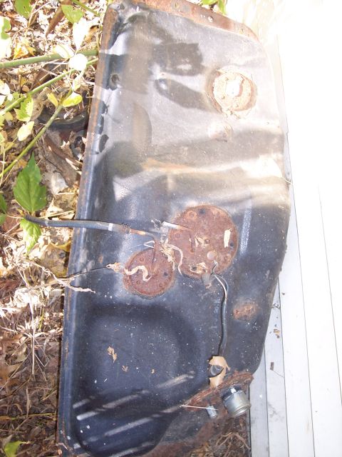 2006 Chevrolet Corvette - This is a used fuel tank, likely removed from a vehicle, showing signs of rust and wear.