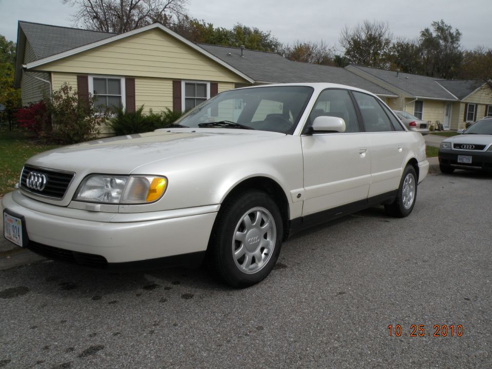 White 1995 Audi A6 sedan, 3/4 front view