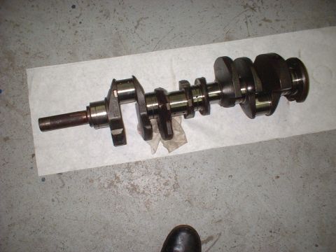 1964 Ford Galaxie - Engine crankshaft shown on a paper towel, likely before installation or after removal.