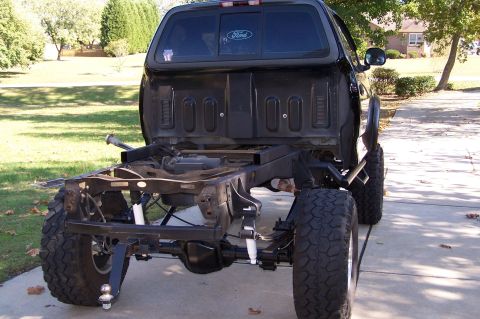 2000 Ford F-150 - Rear view of a 2000 Ford F-150 chassis, showing the suspension and axle components.