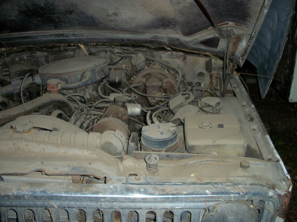1976 Jeep J-10 engine bay with V8 engine and air cleaner