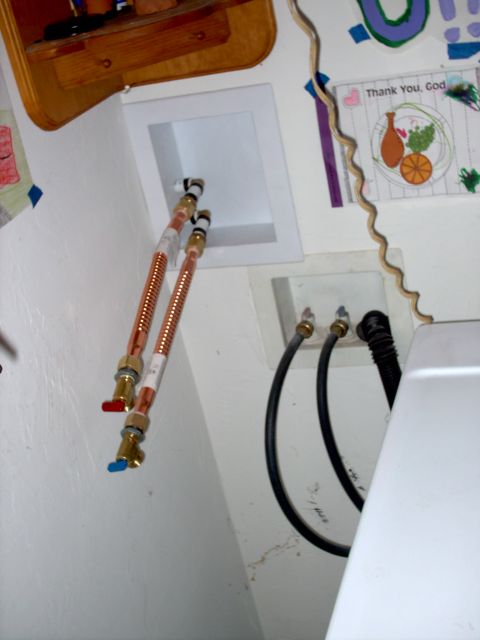 1965 Ford Mustang - Copper water supply lines and hoses for a washing machine hookup.