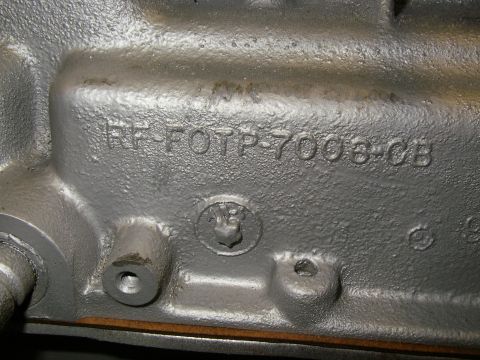 1990 Ford Bronco - Engine part with casting numbers RF-FOTP-7008-CB visible.