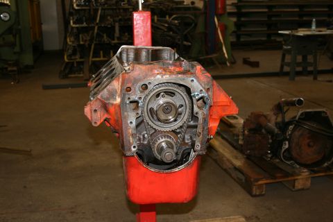 1973 Ford Ranchero - Engine block on a stand, showing the internal timing gears and front crankshaft pulley assembly.