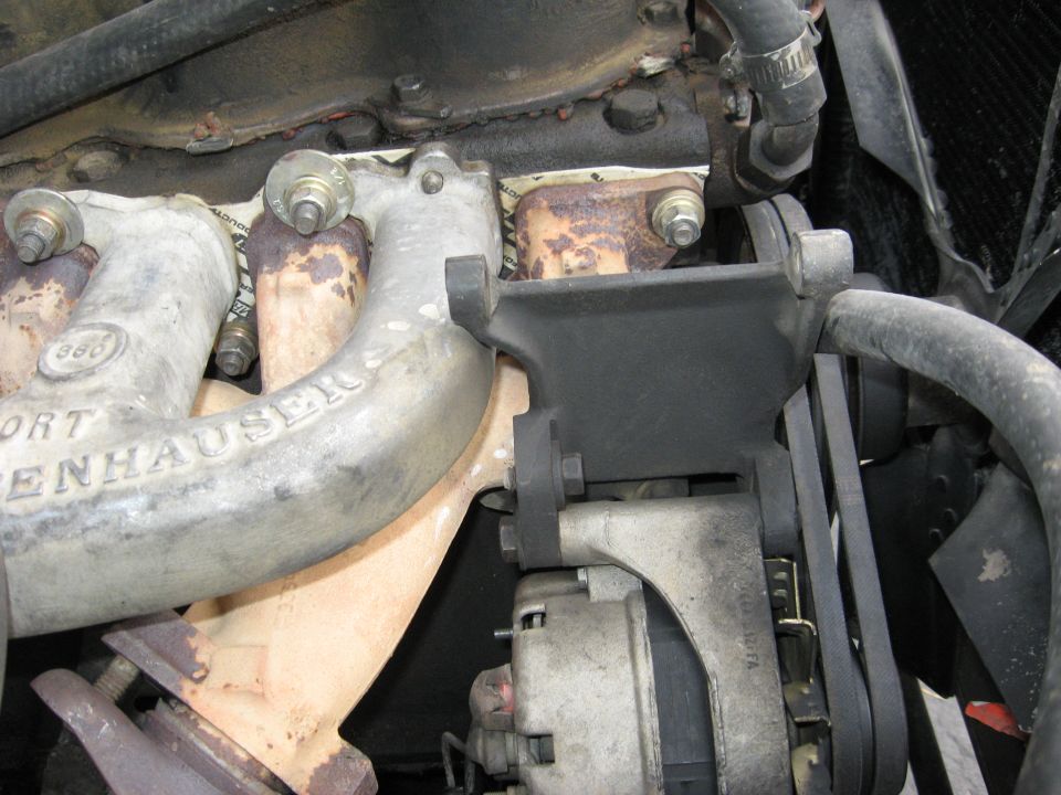 The alternator and smog pump bracket on some years gets in the way of the intake.  Fortunately, mine didn't have any clearance issues.