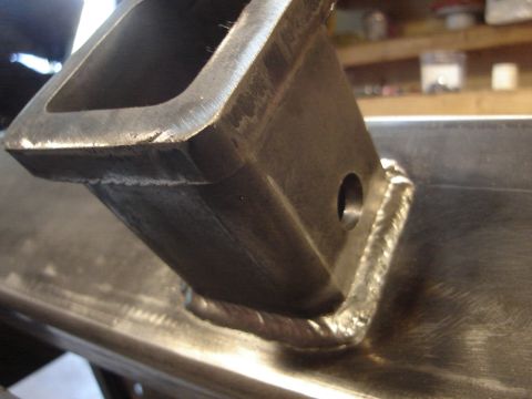 1989 Ford Bronco - Close-up view of a welded metal hitch receiver, indicating a custom or aftermarket part.