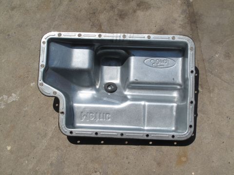 1995 Ford Bronco - This is a Ford transmission pan, likely for a truck or SUV, with a Melling part number visible.