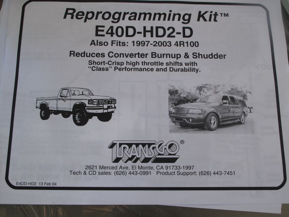TransGo E40D-HD2-D reprogramming kit instruction cover with Ford truck and Lincoln Navigator images