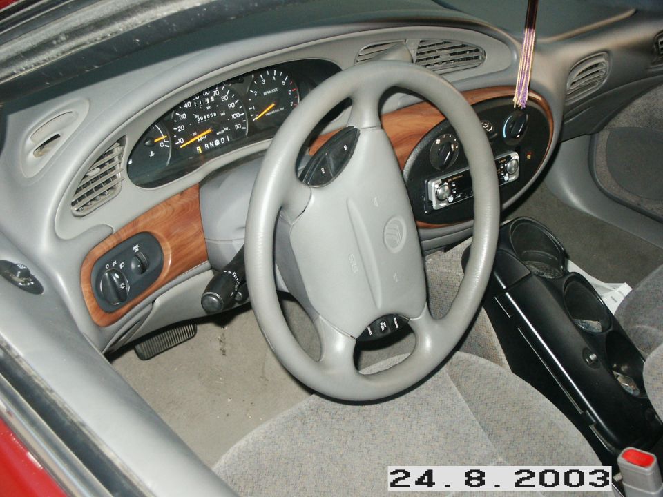 1998 Mercury Sable interior with wood trim and gray dashboard