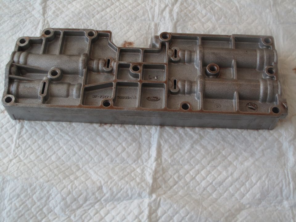Ford transmission valve body with visible part numbers