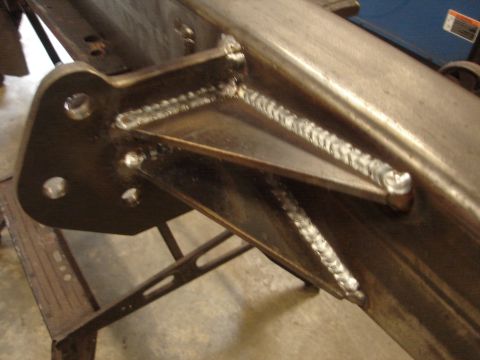 1989 Ford Bronco - This is a close-up view of a welded metal bracket, likely a custom fabrication.