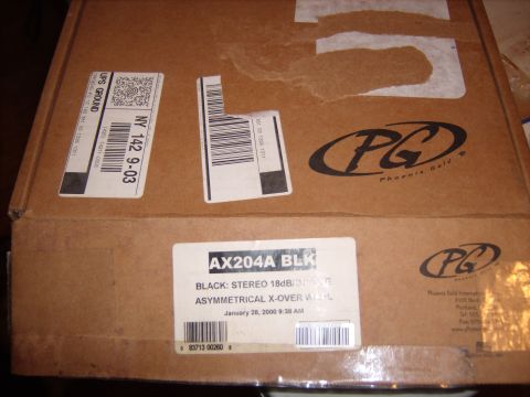 1979 Ford F-250 - A cardboard box displays shipping labels and product details for an audio component.