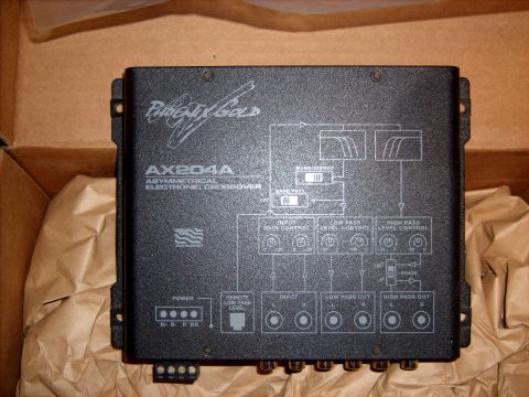 1979 Ford F-250 - This Phoenix Gold AX204A asymmetrical electronic crossover features input and output controls, along with a detailed circuit diagram.