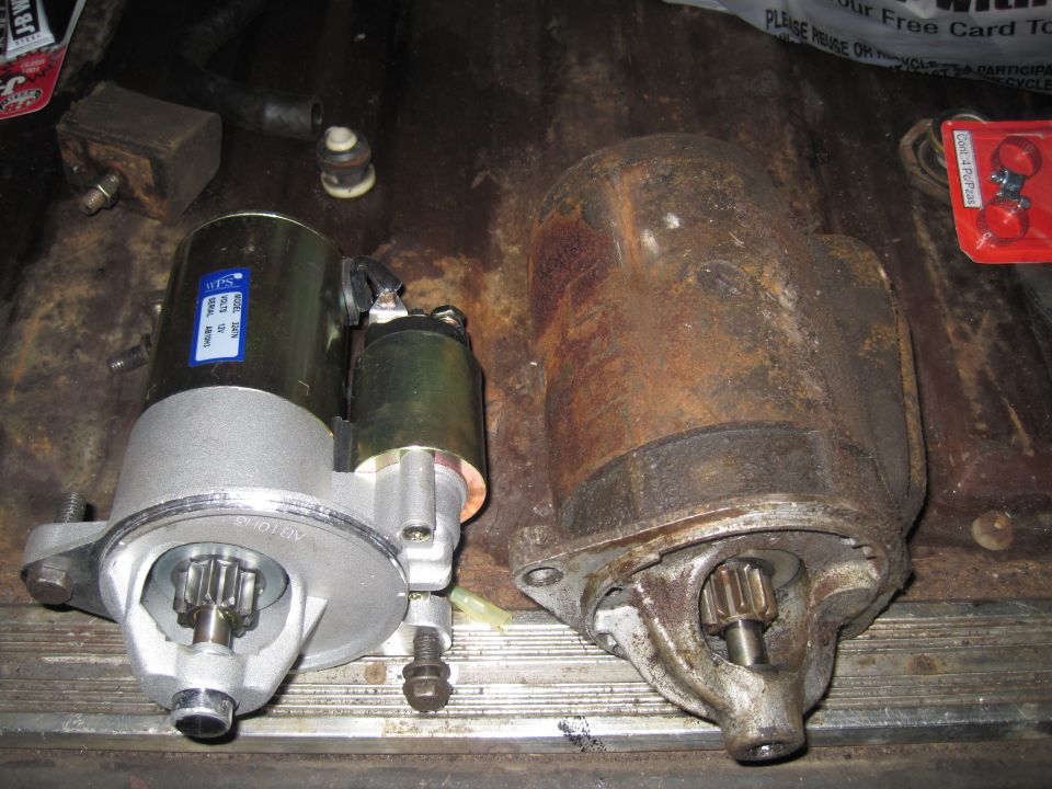 New and old starter motors side-by-side, one with a blue label