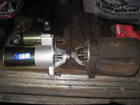 1979 Ford Bronco - A new starter motor is compared to an older, corroded one.