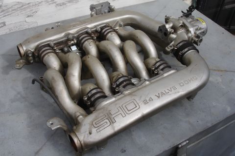 1990 Ford Taurus - Intake manifold with SHO branding and 24 valve DOHC designation.