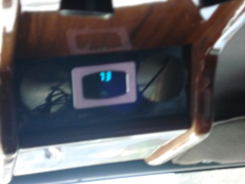1992 Ford C-350 (Centurion Conversions) - A digital gauge displays the number 19 within the interior of a vehicle.
