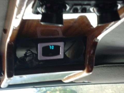 1992 Ford C-350 (Centurion Conversions) - The interior of a vehicle shows a digital display reading 78, likely indicating temperature.