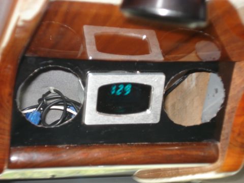 1992 Ford C-350 (Centurion Conversions) - A digital gauge with visible wiring is mounted in a custom dashboard panel.