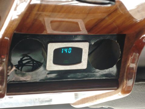 1992 Ford C-350 (Centurion Conversions) - Interior view of a digital gauge showing 140, set within a custom dashboard.