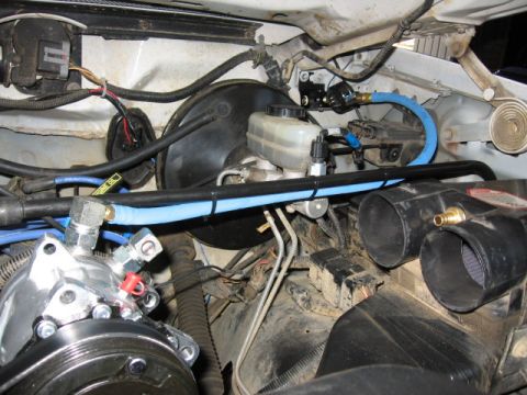1995 Ford Bronco - Little brass plug over on the engine intake box will be the filtered intake for the compressor. Plug has like a 1" catch on the inside…
