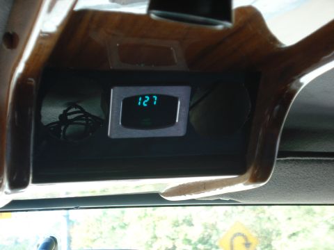 1992 Ford C-350 (Centurion Conversions) - A digital gauge with a reading of 127 is visible in the vehicle's interior.