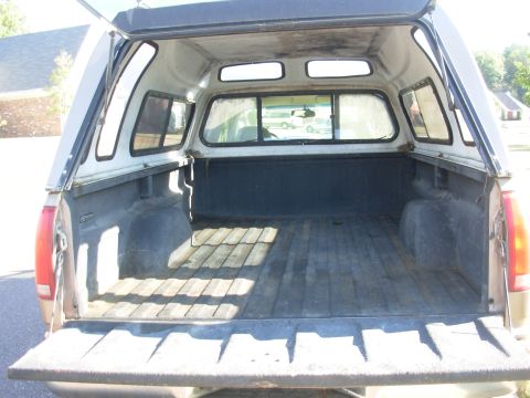 1997 Chevrolet Silverado 3500 - Camper shell was repainted in 97 when it was transferred to this truck. Rhino was applied a few months after the truck was bought. SOLD 199…