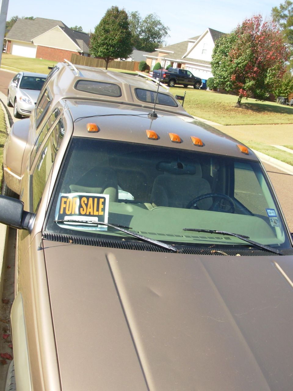 Hood dents & camper windows damaged by trees from hurricane Rita.  Dents have been repaired & window crack sealed with E6000.

SOLD
1997 Chevy K3500 Silverado 205Kmi 4WD 1-ton dually

E-mail me thru my profile here or search CraigsList Memphis.
NEVER WRECKED - NO MAJOR REPAIRS
Most service was done at the dealership.
- 6.5L TurboDiesel (no smoke/leaks/rattles/squeaks)
- 4L80-E
- 4.10 PosiTrac
- Light Autumnwood (camper matches)
- tilt cruise cassette PW/PL/PM/RKE
- leather steering wheel & shifter
- autodimming compass RV mirror
- single 34 gal tank
- new Curt Class V hitch receiver 
- factory skid plates (no scars)
- 7 Michelin X-Radials LT225/75R16
- 2 new batteries 2012 with stainless studded terminals

New Dorman LLT FSD 2013
Reman HydroBoost 2012
New injection pump 2010
New drivebelt 2010
New driver's inside door handle 2012
Trans flush 2010
New rear brake cylinders & shoes, axle seals 2010
New A/C compressor
New master cylinder 2009
New vacuum pump 2005
Ball joints & pitman arm 2004