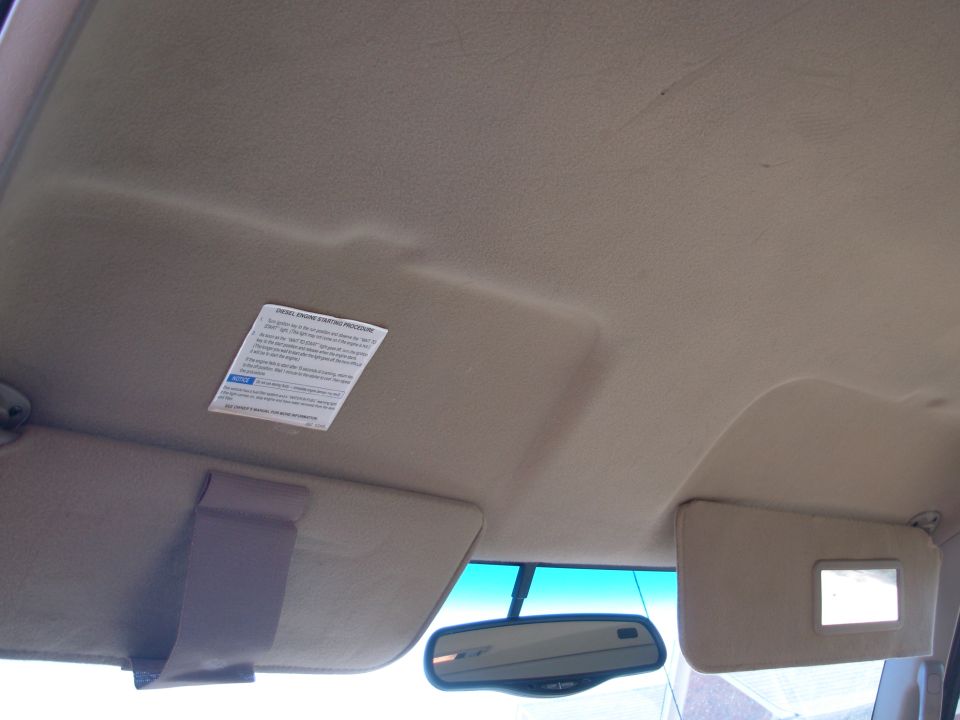 These visors have been replaced with reupholstered factory extendable lighted visors, and a factory overhead console was added with factory HomeLink.

SOLD
1997 Chevy K3500 Silverado 205Kmi 4WD 1-ton dually

E-mail me thru my profile here or search CraigsList Memphis.
NEVER WRECKED - NO MAJOR REPAIRS
Most service was done at the dealership.
- 6.5L TurboDiesel (no smoke/leaks/rattles/squeaks)
- 4L80-E
- 4.10 PosiTrac
- Light Autumnwood (camper matches)
- tilt cruise cassette PW/PL/PM/RKE
- leather steering wheel & shifter
- autodimming compass RV mirror
- single 34 gal tank
- new Curt Class V hitch receiver 
- factory skid plates (no scars)
- 7 Michelin X-Radials LT225/75R16
- 2 new batteries 2012 with stainless studded terminals

New Dorman LLT FSD 2013
Reman HydroBoost 2012
New injection pump 2010
New drivebelt 2010
New driver's inside door handle 2012
Trans flush 2010
New rear brake cylinders & shoes, axle seals 2010
New A/C compressor
New master cylinder 2009
New vacuum pump 2005
Ball joints & pitman arm 2004