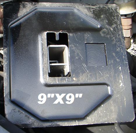1995 Ford Bronco - Close-up of a metal bracket with 9"x9" dimensions visible, showing internal structure.