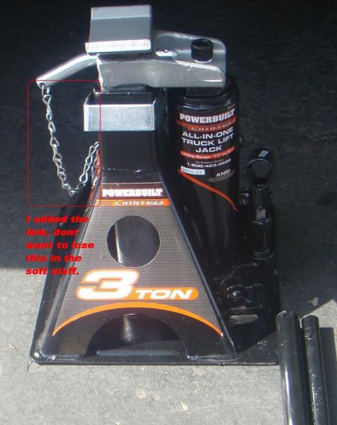 1995 Ford Bronco - A Powerbuilt all-in-one truck lift jack is shown, with a chain added to the safety latch.