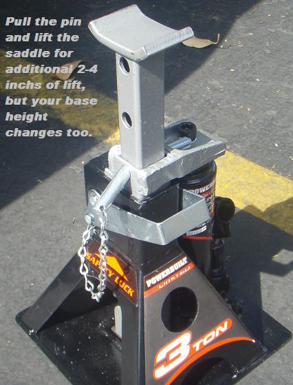1995 Ford Bronco - This jack stand has "Powerbuilt" and "3 TON" labels, with instructions on how to adjust its height.