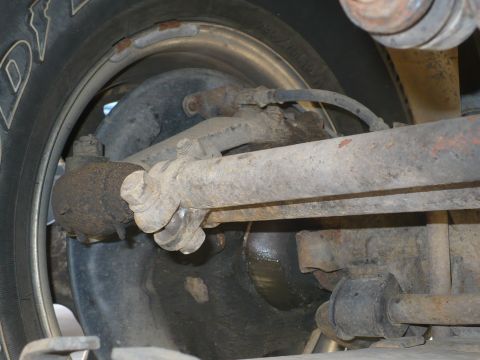 1986 Toyota Land Cruiser - Undercarriage view of a vehicle's steering and suspension components.