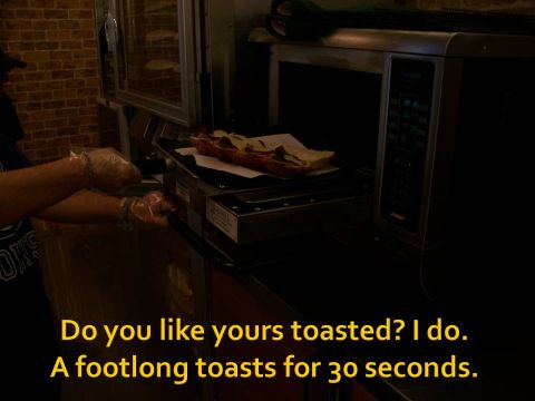 1989 Ford Bronco - A footlong sandwich is being toasted for 30 seconds in a commercial toaster oven.