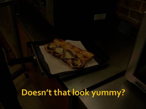 1989 Ford Bronco - A sandwich is presented on a tray, with text asking "Doesn't that look yummy?".