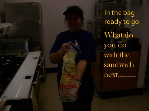 1989 Ford Bronco - A person in a Subway uniform holds a bagged sandwich, with text overlay asking what to do with it next.