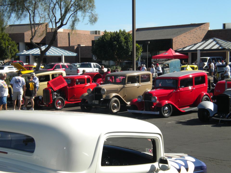 Our 32 Ford Tudor Sedan is the Battalion Beige one in the middle.