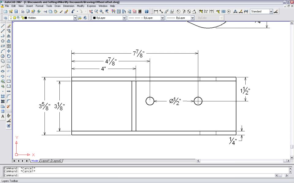 AutoCAD dimensioned drawing of a rectangular plate with two half-inch holes