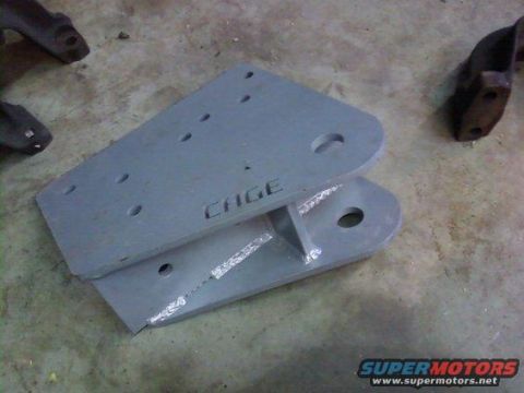 1995 Ford Bronco - Metal bracket labeled CAGE, likely a custom automotive part.