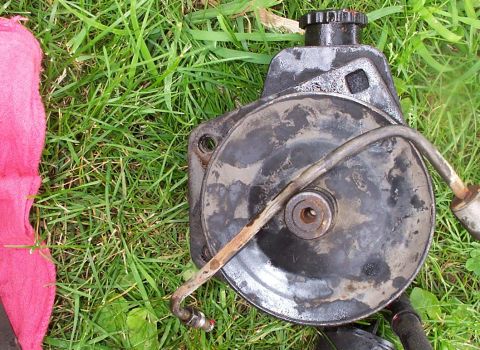 1986 Ford Bronco - Saginaw pump and its own bracket. Bolt holes are 3-1/8" apart.