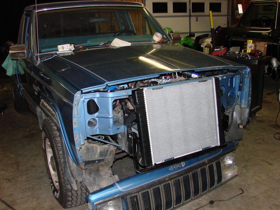 1991 Jeep Comanche front end disassembled, radiator exposed